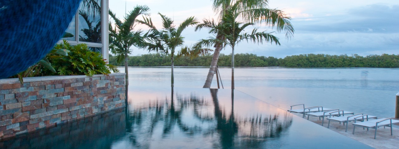 infinity-edge-pool-palm-trees-hammock-bay