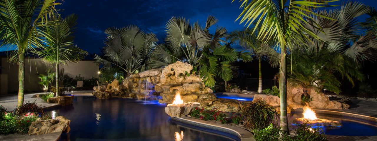 Natural lagoon pool Rock Waterfalls Stone Fire Pits and Natural Grotto