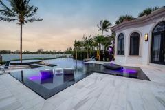 Modern pool design with expansive sun shelf