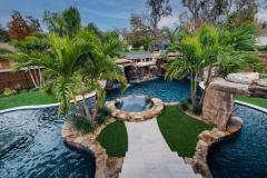 Signature Series Insane Pool with massive grotto and spa island