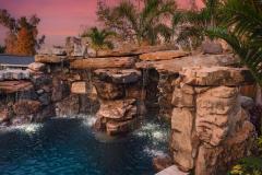 Signature Series Insane Pool with grotto at night
