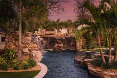 Signature Series Insane Pool with grotto at night