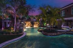 Signature Series Insane Pool with grotto at night