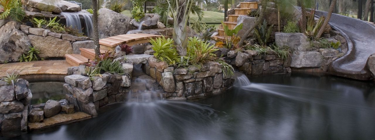 Lagoon Pool Remodel into Tropical Resort with Slide, Grotto and Stream